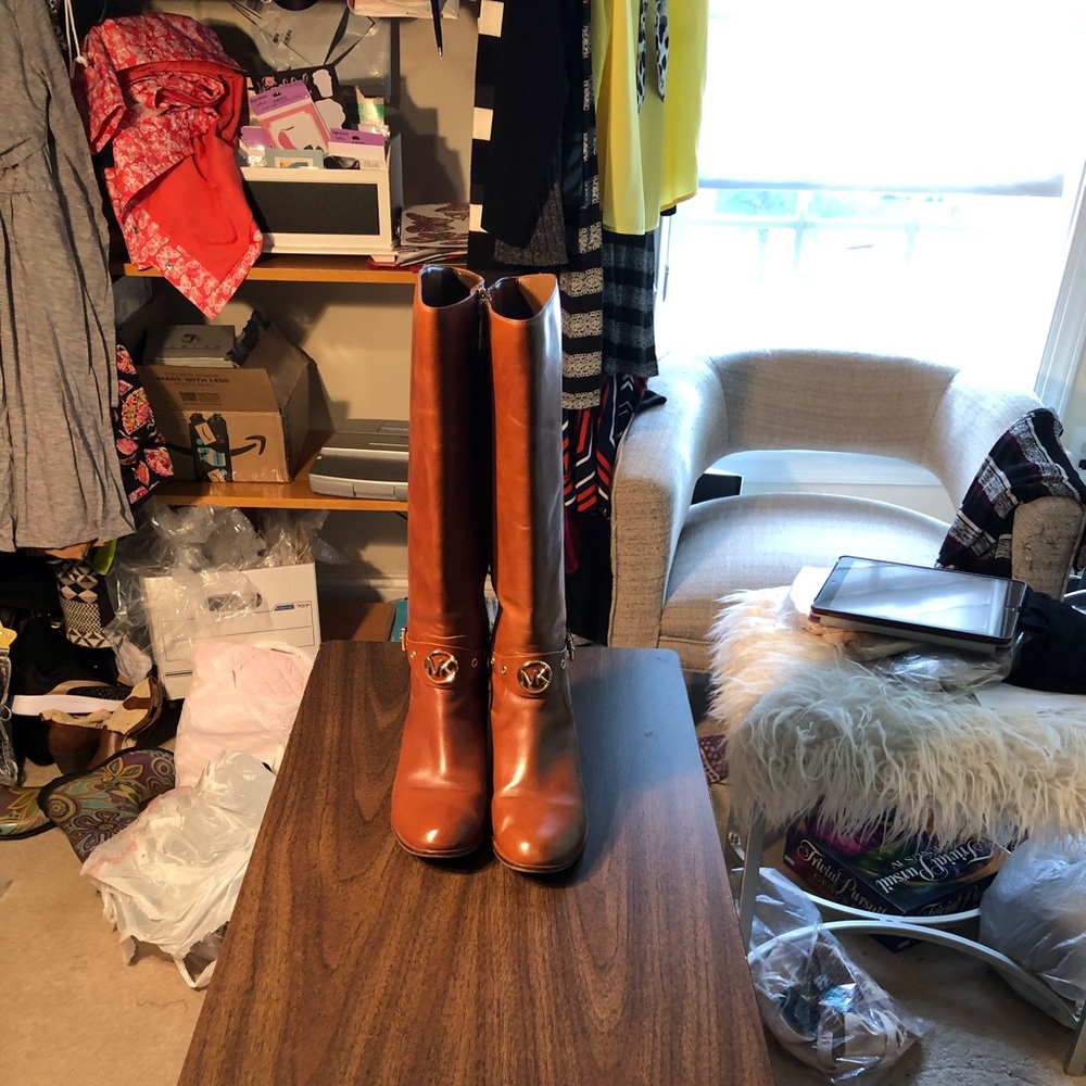 Michael Kors boots new except for one thin hairline scratch